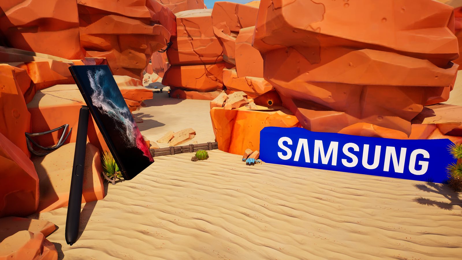 Red canyon rock and sand, a Galaxy Note20 standing upright with its stylus, and a Samsung sign in the dune