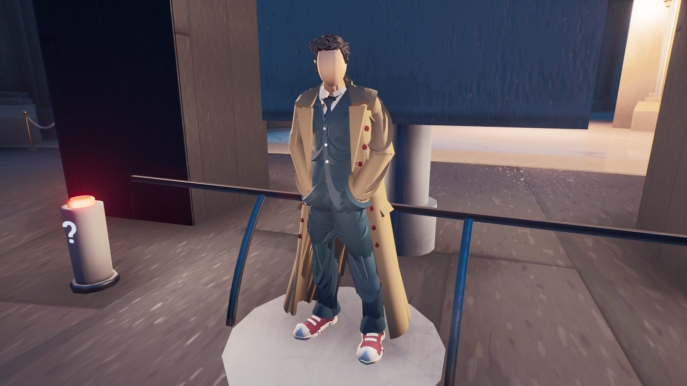 The Tenth Doctor's costume on a plinth: brown coat, pinstripe suit and trainers